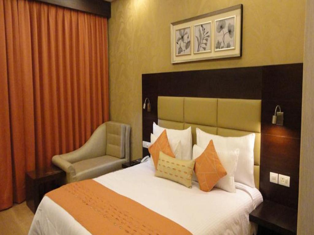 Corporate Regency Hotell New Delhi Rom bilde